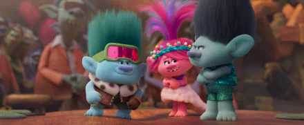 Colorful characters from Trolls Band Together display their vibrant styles in this HD desktop wallpaper, showcasing a lively moment filled with personality and fun.