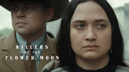 HD Wallpaper featuring a stoic man and woman from Killers of the Flower Moon movie for desktop background.