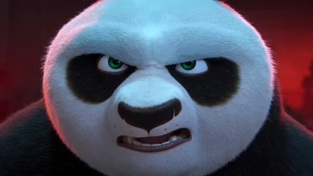 Close-up of Po from Kung Fu Panda 4, showcasing an intense expression, set against a dramatic background. A striking HD wallpaper for fans of the franchise.
