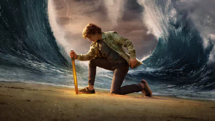 Percy Jackson and the Olympians TV show wallpaper featuring a character kneeling on a beach with a sword, with a massive wave and lightning in the background.