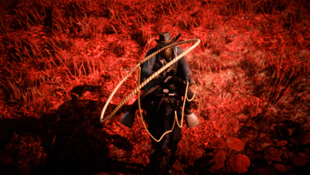 Arthur Morgan on horseback in a dramatic red-hued scene from Red Dead Redemption 2, captured in stunning 8K Ultra HD for a Rockstar Games PC desktop wallpaper.