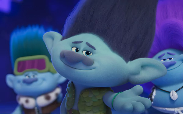 Colorful HD wallpaper from the movie Trolls Band Together, featuring cheerful trolls with vibrant hairstyles and lively expressions against a whimsical background.
