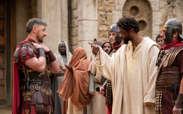 The Book of Clarence movie scene wallpaper featuring characters in historical costumes in a dynamic dialogue for desktop background.