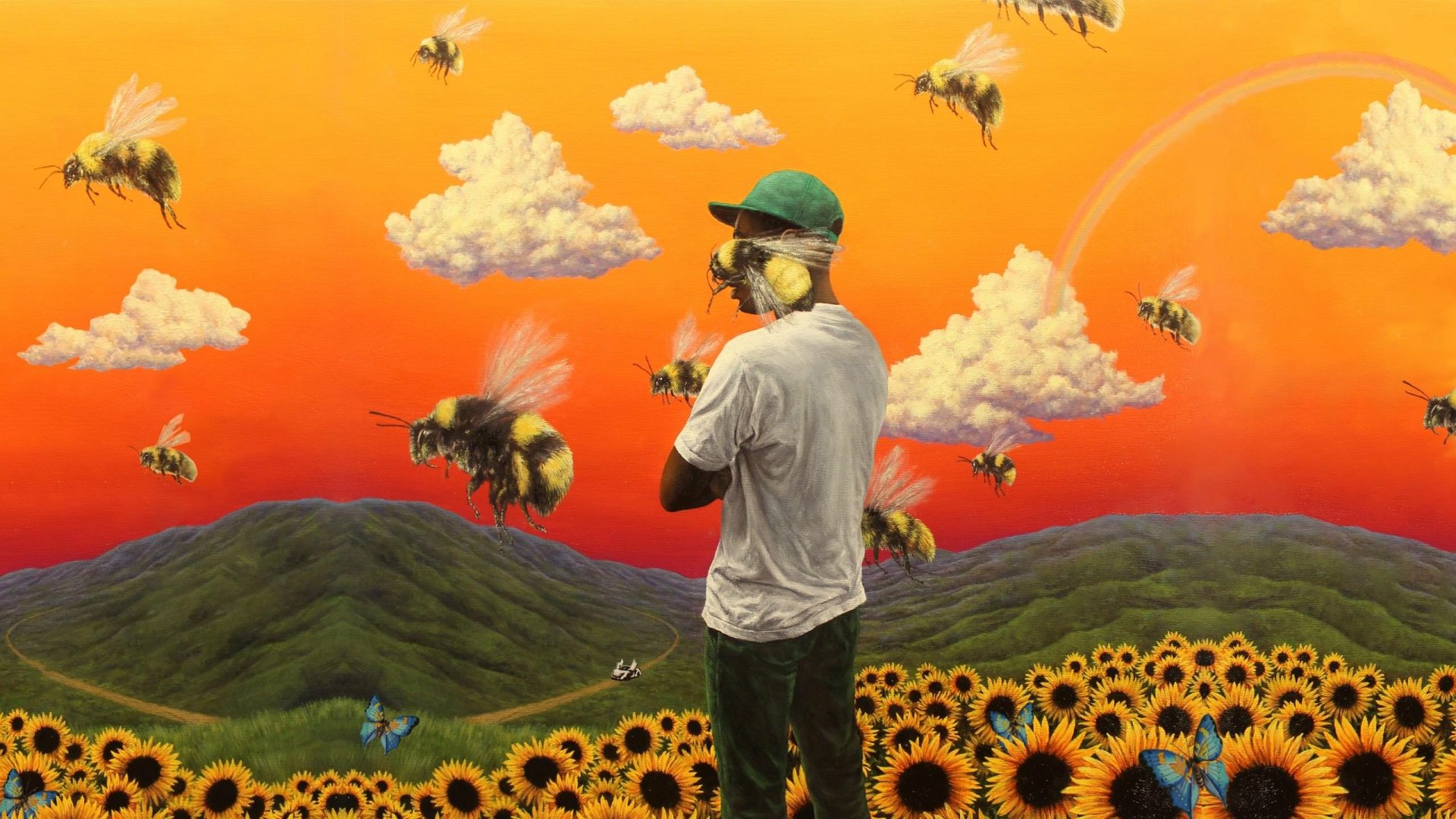 HD desktop wallpaper featuring an artistic representation of a person standing in a vibrant sunflower field with oversized bees, against a sunset sky, evoking the style of Tyler the Creator's music themes.