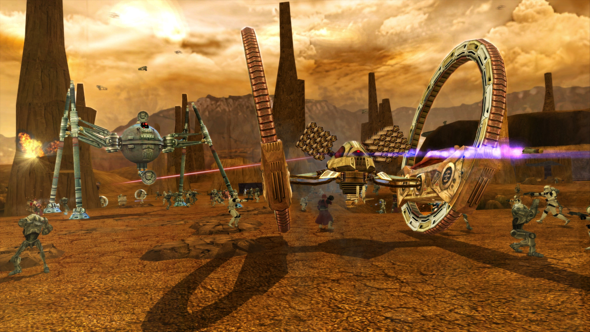 HD desktop wallpaper from Star Wars: Battlefront Classic Collection featuring an intense battle scene with starfighters, droids, and vehicles on a desert planet.