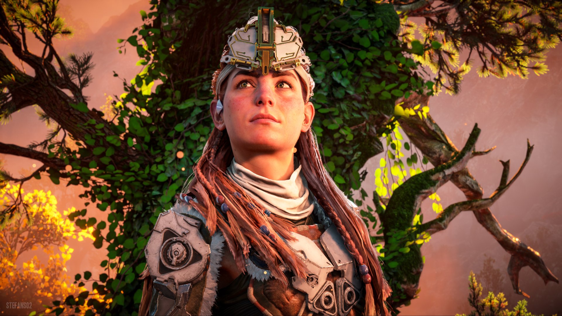 Aloy from Horizon Forbidden West stands confidently against a vibrant sunset backdrop, captured in this detailed 4K Ultra HD PC desktop wallpaper.