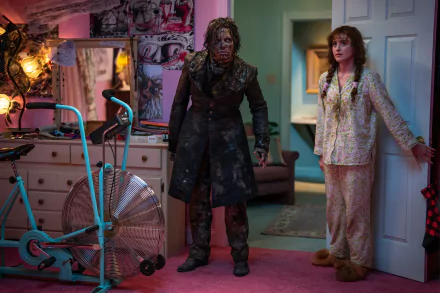 HD desktop wallpaper with a scene from Lisa Frankenstein, featuring two characters standing in a vibrantly colored room.