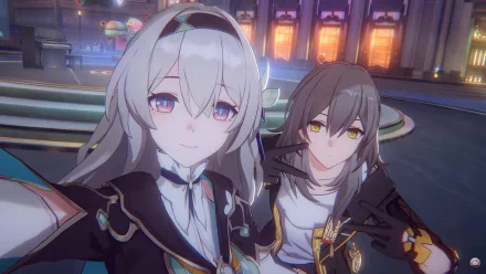 A vibrant HD wallpaper featuring Firefly and Stelle from the video game Honkai: Star Rail, captured in a colorful in-game setting.