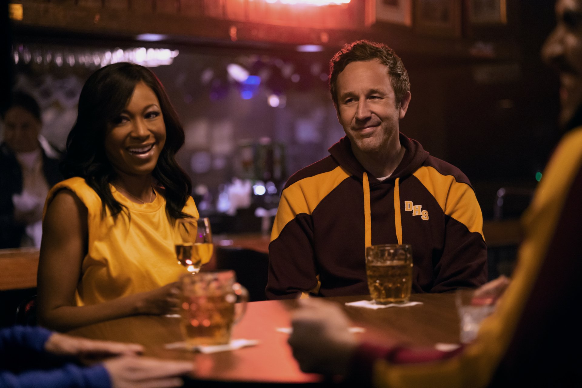 HD desktop wallpaper from The Big Door Prize TV show featuring two characters smiling at a bar.