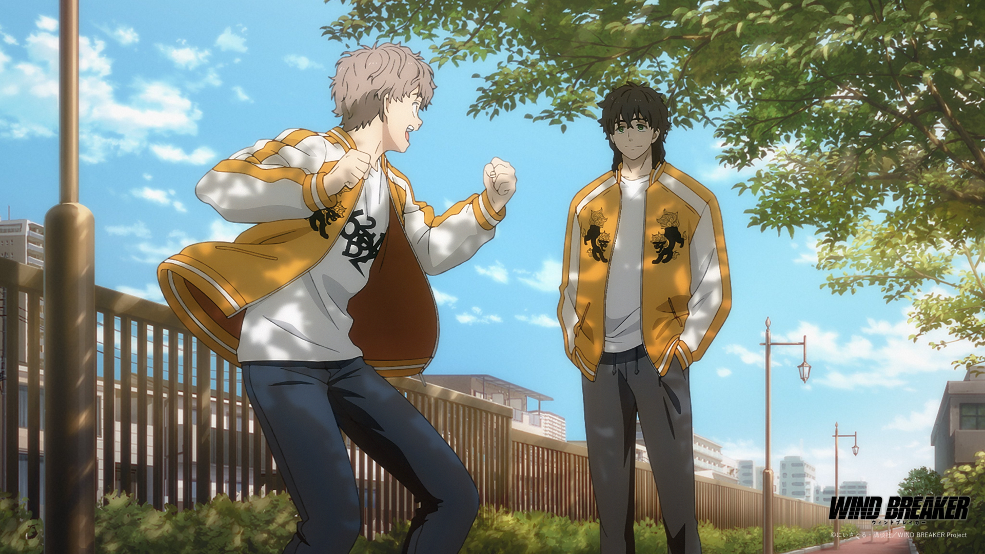 Two anime characters from Wind Breaker, one animatedly talking and the other quietly listening, stand under a tree-lined street with a clear blue sky. HD desktop wallpaper and background.