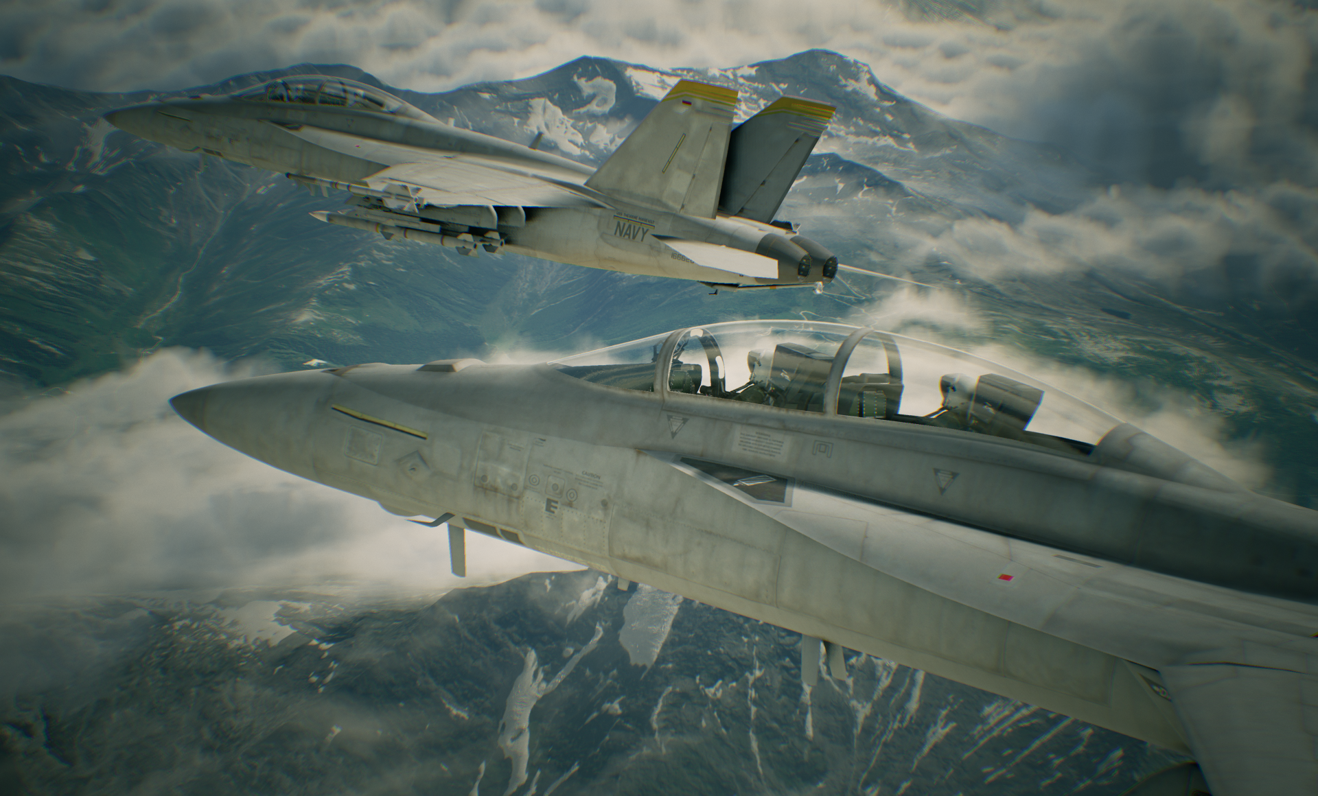 HD wallpaper featuring two fighter jets soaring above cloud-covered mountains from the video game Ace Combat 7: Skies Unknown.