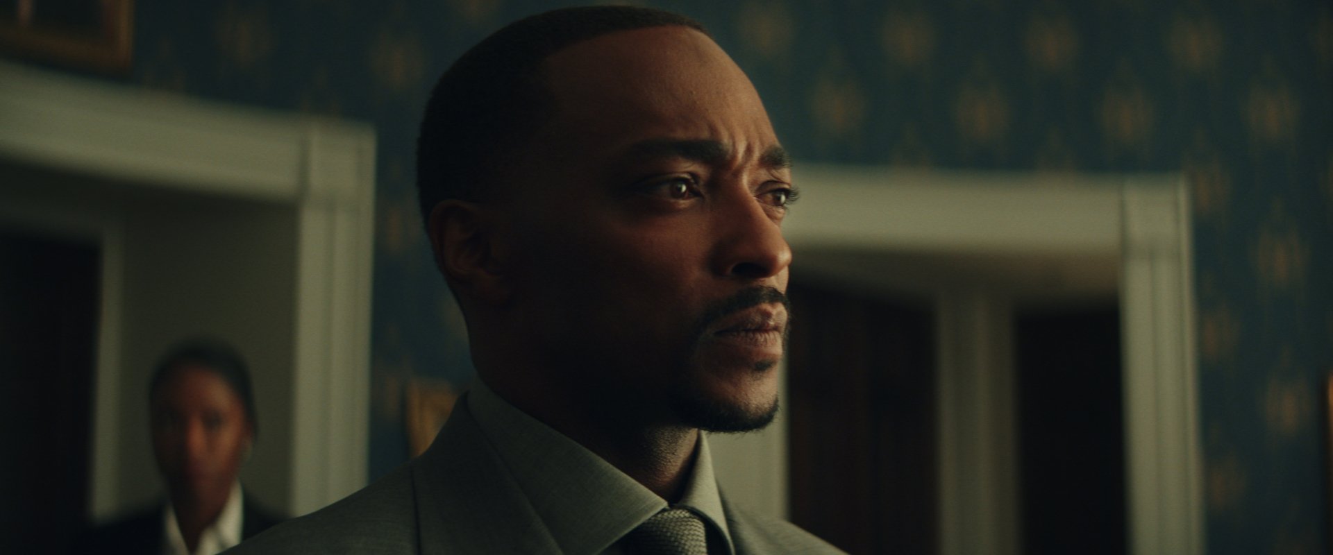 HD desktop wallpaper of Anthony Mackie portraying a serious expression in Captain America: Brave New World.