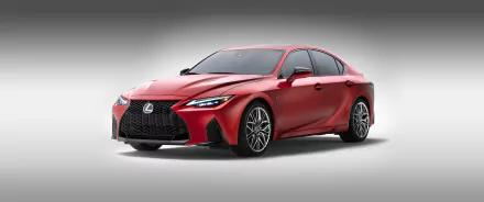 HD desktop wallpaper of a red Lexus IS 500 F Sport Performance, showcasing its sleek design and dynamic aesthetics against a gradient background.