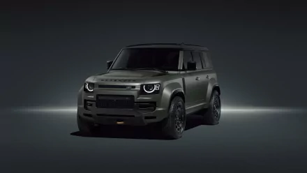 HD desktop wallpaper featuring the rugged and powerful Land Rover Defender Octa vehicle against a dark, minimalistic background.