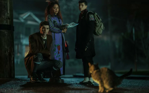 HD desktop wallpaper featuring characters from the TV show Dead Boy Detectives in a moody, nighttime setting, with a cat in the foreground.