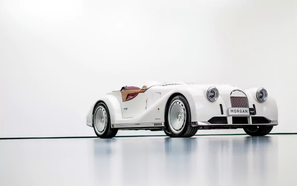 HD desktop wallpaper featuring a white Morgan Midsummer car with an elegant, minimalist background.