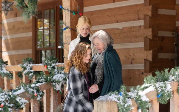 HD desktop wallpaper and background tagged A Family Affair, featuring three individuals standing on a snow-decorated wooden porch, presumably from a movie scene.