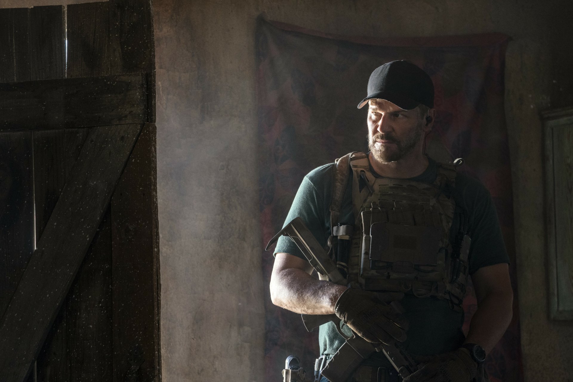 HD desktop wallpaper featuring imagery from the TV show Seal Team. A dynamic backdrop capturing the essence of military teamwork and action.