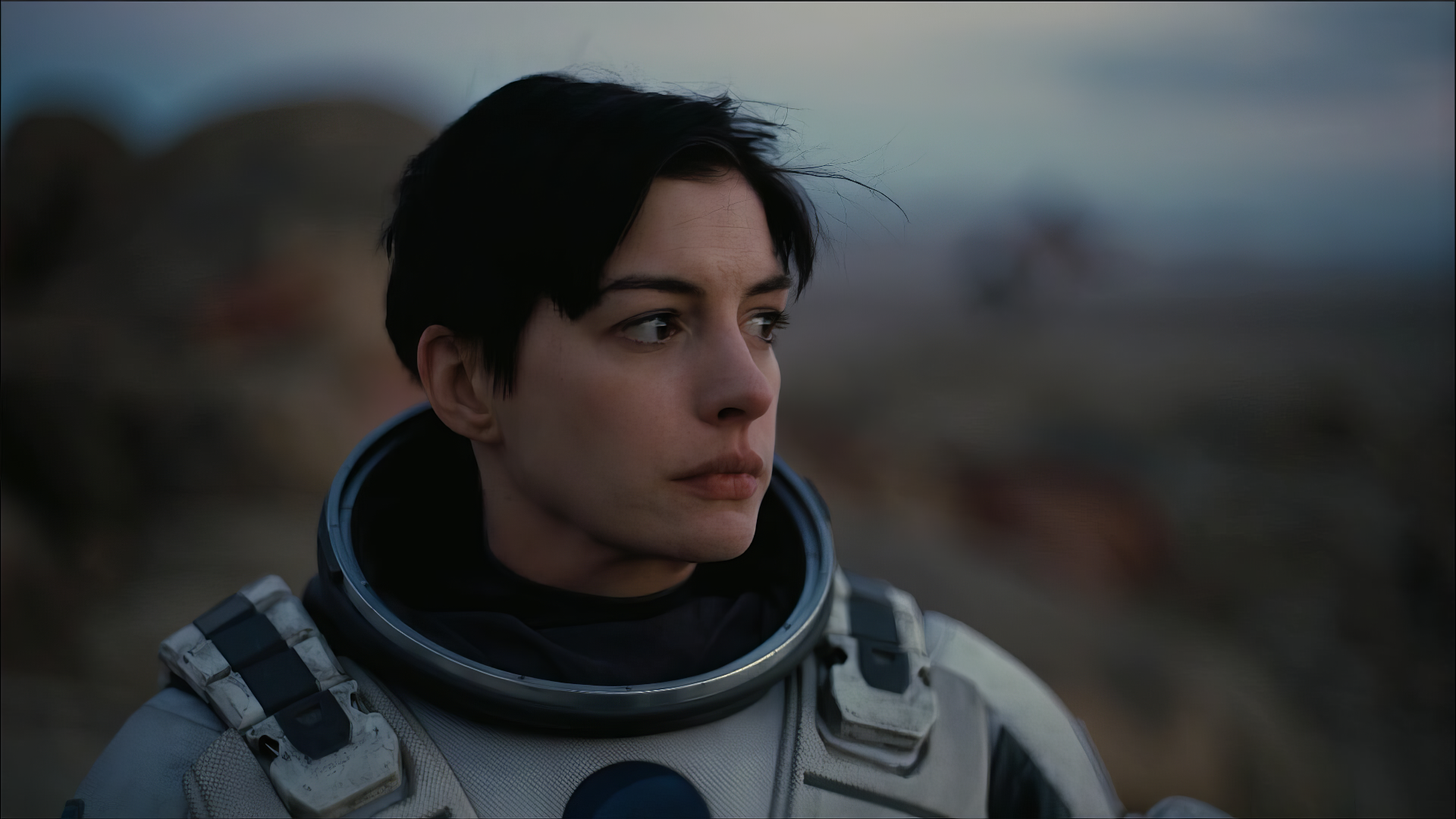 HD desktop wallpaper featuring a scene from the movie Interstellar, showcasing Anne Hathaway in a captivating cosmic setting.