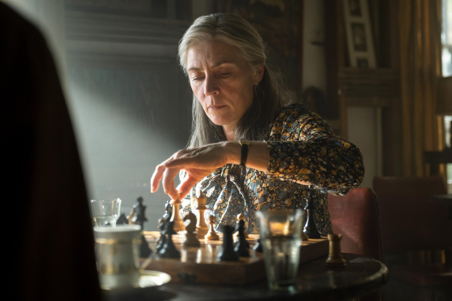 A 4K Ultra HD wallpaper featuring chess elements inspired by the TV show Slow Horses, showcasing strategic tension and intrigue.