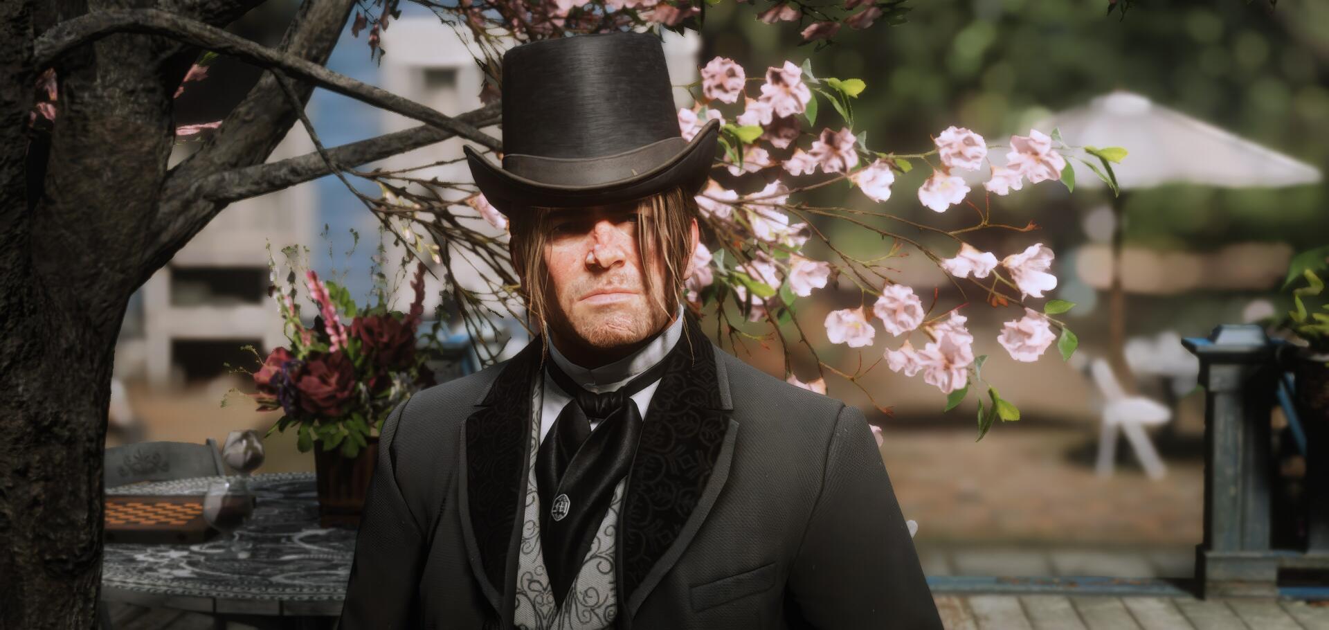 HD desktop wallpaper featuring imagery from the video game Red Dead Redemption 2, showcasing the game's stunning landscapes and immersive atmosphere.