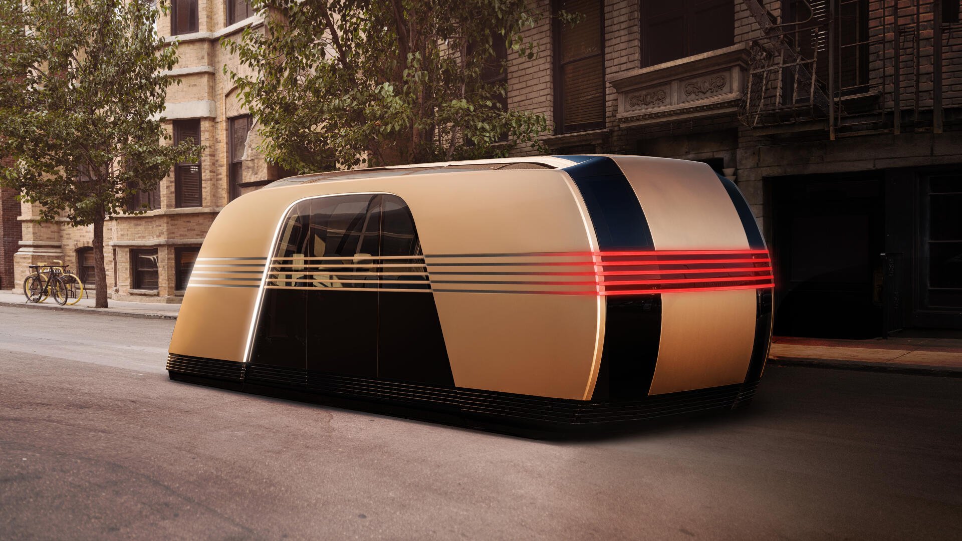A futuristic Tesla robovan features a sleek, modern design with a striking gold and black color scheme, illuminated by red accents, set against an urban backdrop in this 8K Ultra HD wallpaper.