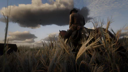 A 4K Ultra HD PC wallpaper featuring Arthur Morgan from Red Dead Redemption 2 riding a horse through a grassy field under a dramatic cloudy sky.