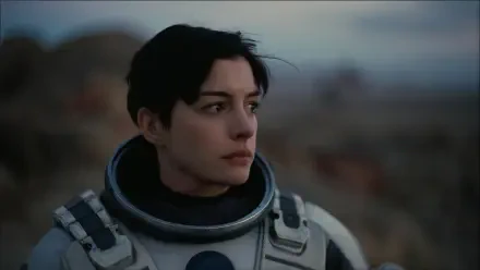 HD desktop wallpaper featuring a scene from the movie Interstellar, showcasing Anne Hathaway in a captivating cosmic setting.