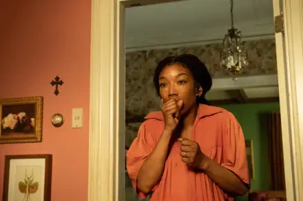 A 4K Ultra HD wallpaper featuring Brandy Norwood from the movie The Front Room, showcasing vibrant colors and dynamic imagery.