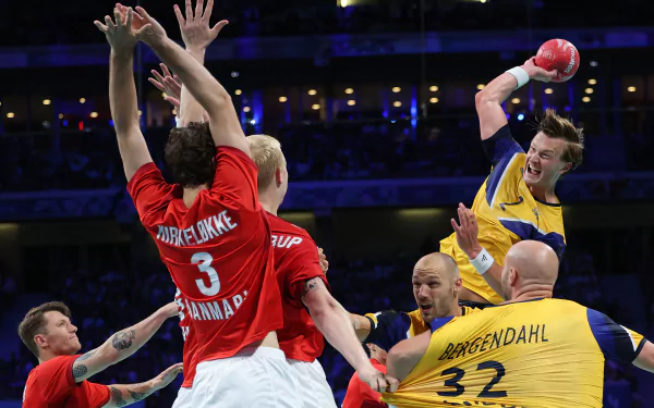HD wallpaper celebrating the Olympic Games Paris 2024, featuring Swedish handball, capturing the spirit of sports and competition.
