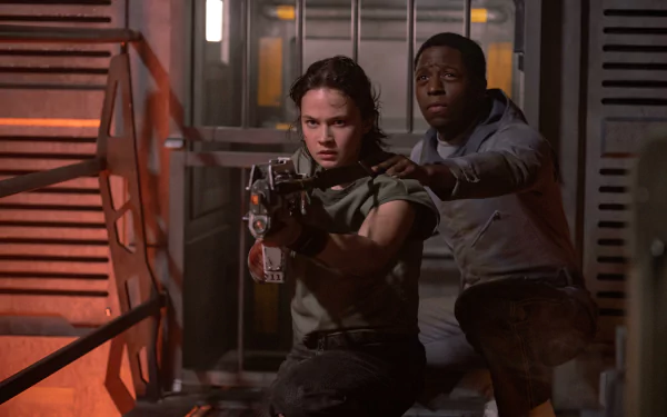 HD wallpaper featuring scenes from Alien: Romulus, showcasing stars Cailee Spaeny and David Jonsson. A stunning background for fans of the franchise.