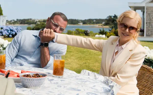 A high-definition desktop wallpaper featuring Nicole Kidman and Liev Schreiber from the TV show The Perfect Couple. Engaging visual for fans of the series.