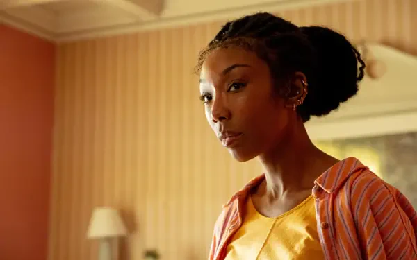A vibrant 4K Ultra HD wallpaper featuring Brandy Norwood from the movie The Front Room, enhancing your desktop with cinematic flair.