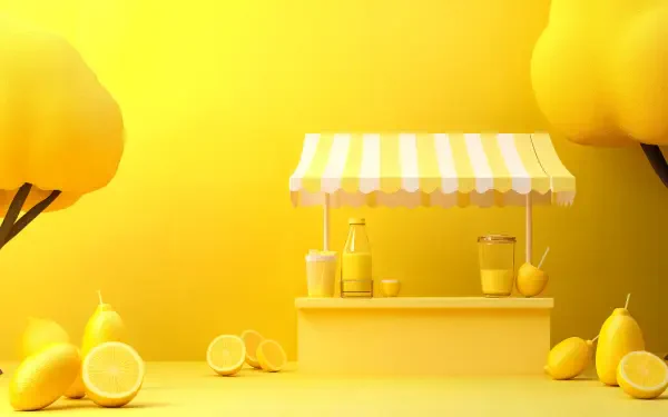 A vibrant lemonade stand surrounded by fresh lemons, set against a cheerful yellow backdrop. This 4K Ultra HD image captures the essence of summer and refreshment.