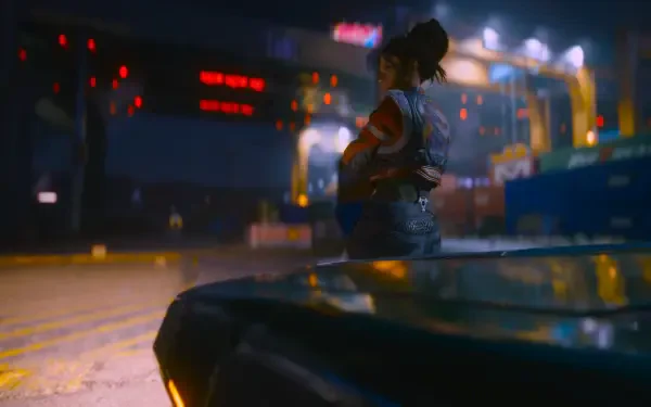 A striking HD wallpaper from Cyberpunk 2077, featuring a character standing beside a sleek car against a vibrant, neon-lit urban backdrop.