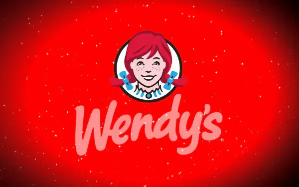 A vibrant 4K Ultra HD wallpaper featuring the Wendy's logo against a bold red background, showcasing the iconic brand's playful spirit.