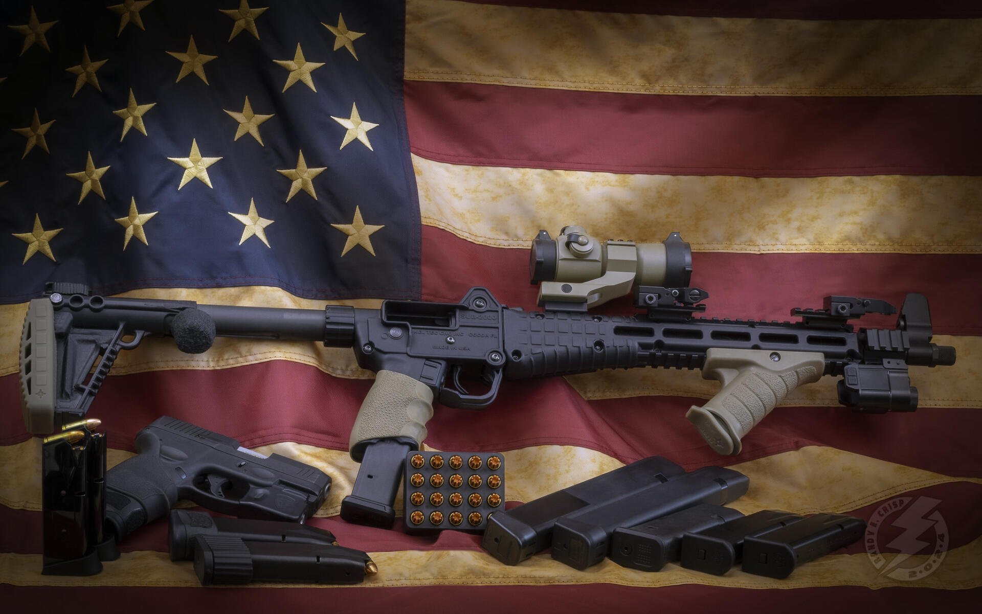 HD PC desktop wallpaper/background showing a tactical gun, magazines and ammo displayed over a weathered American flag.