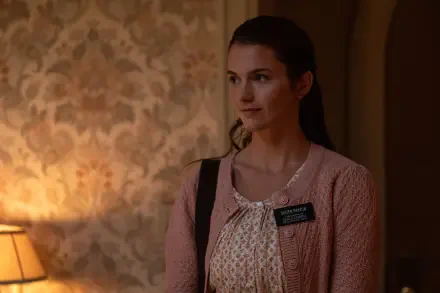 Chloe East stars in Heretic (2024), depicted in this 4K Ultra HD wallpaper, showcasing her thoughtful expression against a softly lit, vintage background.