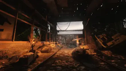 A haunting scene from Metro Exodus, featuring a dilapidated building with debris scattered on the ground, illuminated by natural light streaming through broken windows.
