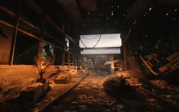A haunting scene from Metro Exodus, featuring a dilapidated building with debris scattered on the ground, illuminated by natural light streaming through broken windows.