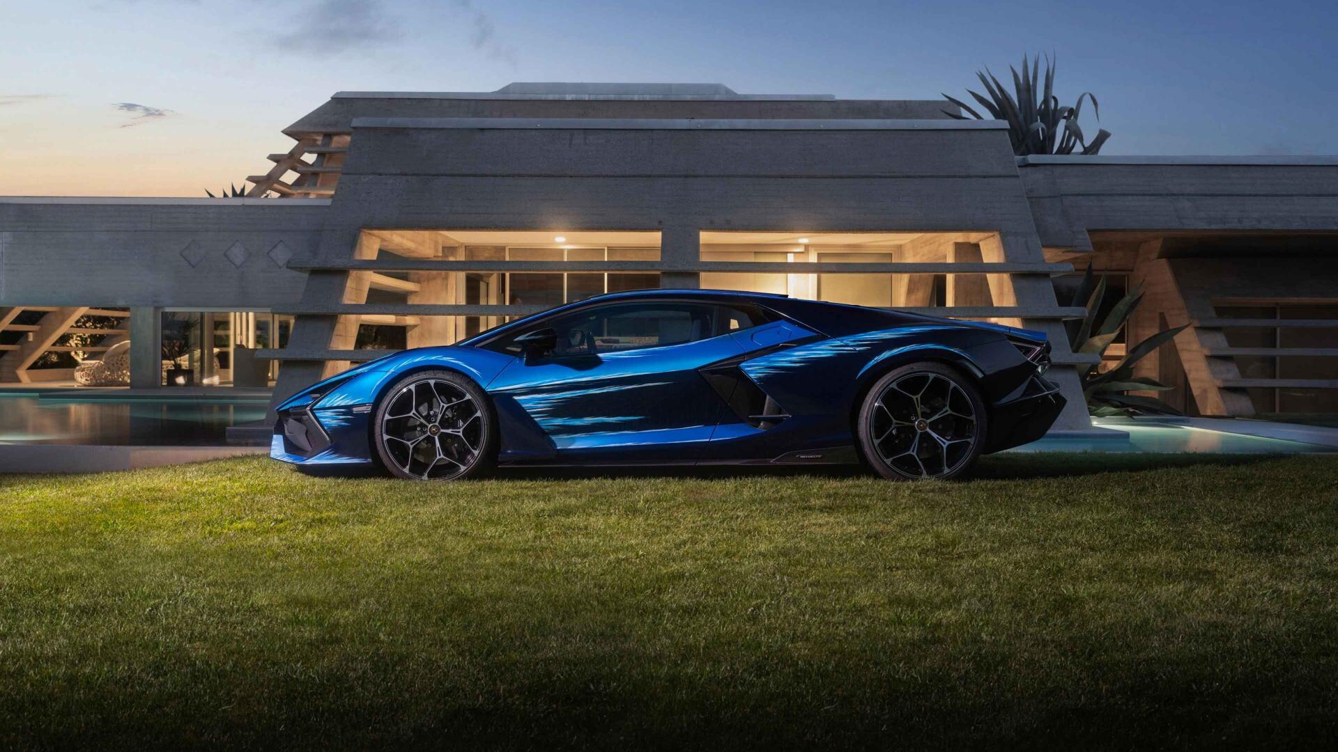 Blue Lamborghini sports car parked on a lawn at dusk in front of a modern house — 4K Ultra HD PC desktop wallpaper and background.