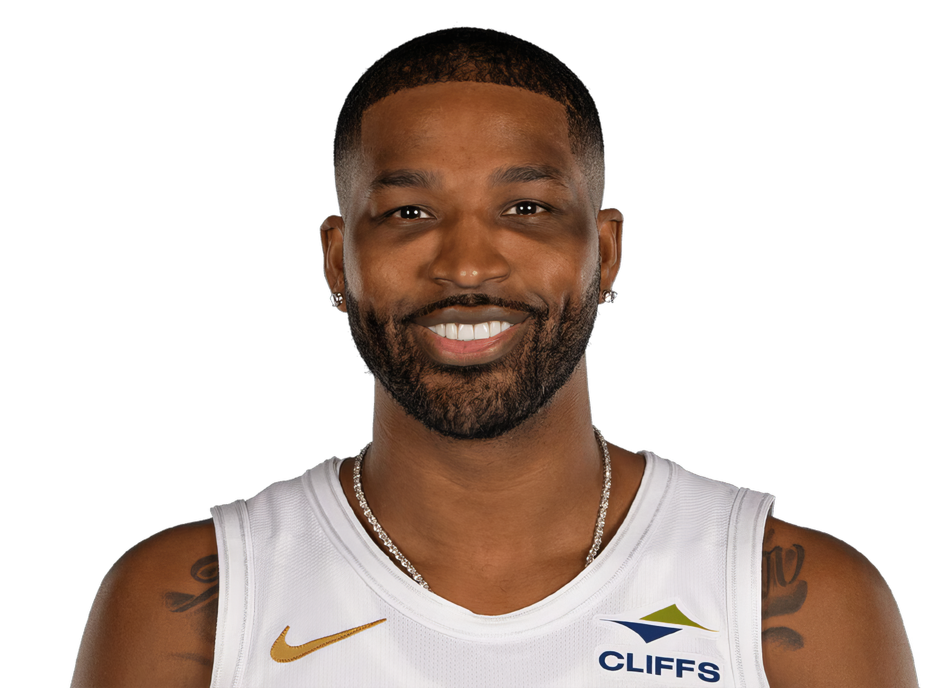 High-definition image of Tristan Thompson, a Cleveland Cavaliers player, smiling in his team jersey. This wallpaper captures Thompson's energetic presence on the basketball court.