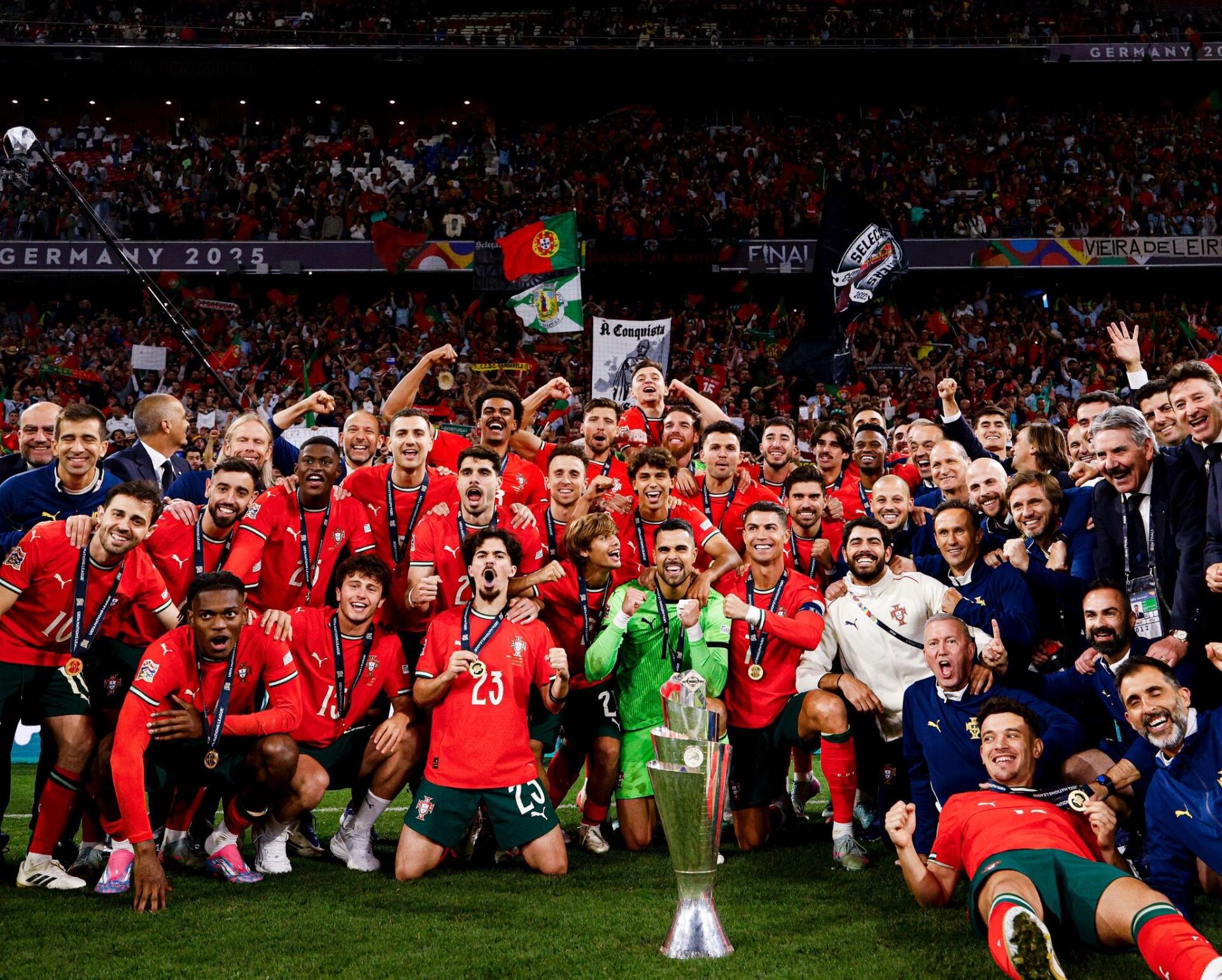 Portugal National Football Team celebrates their victory with Cristiano Ronaldo featured prominently, captured in a vibrant HD soccer-themed desktop wallpaper.