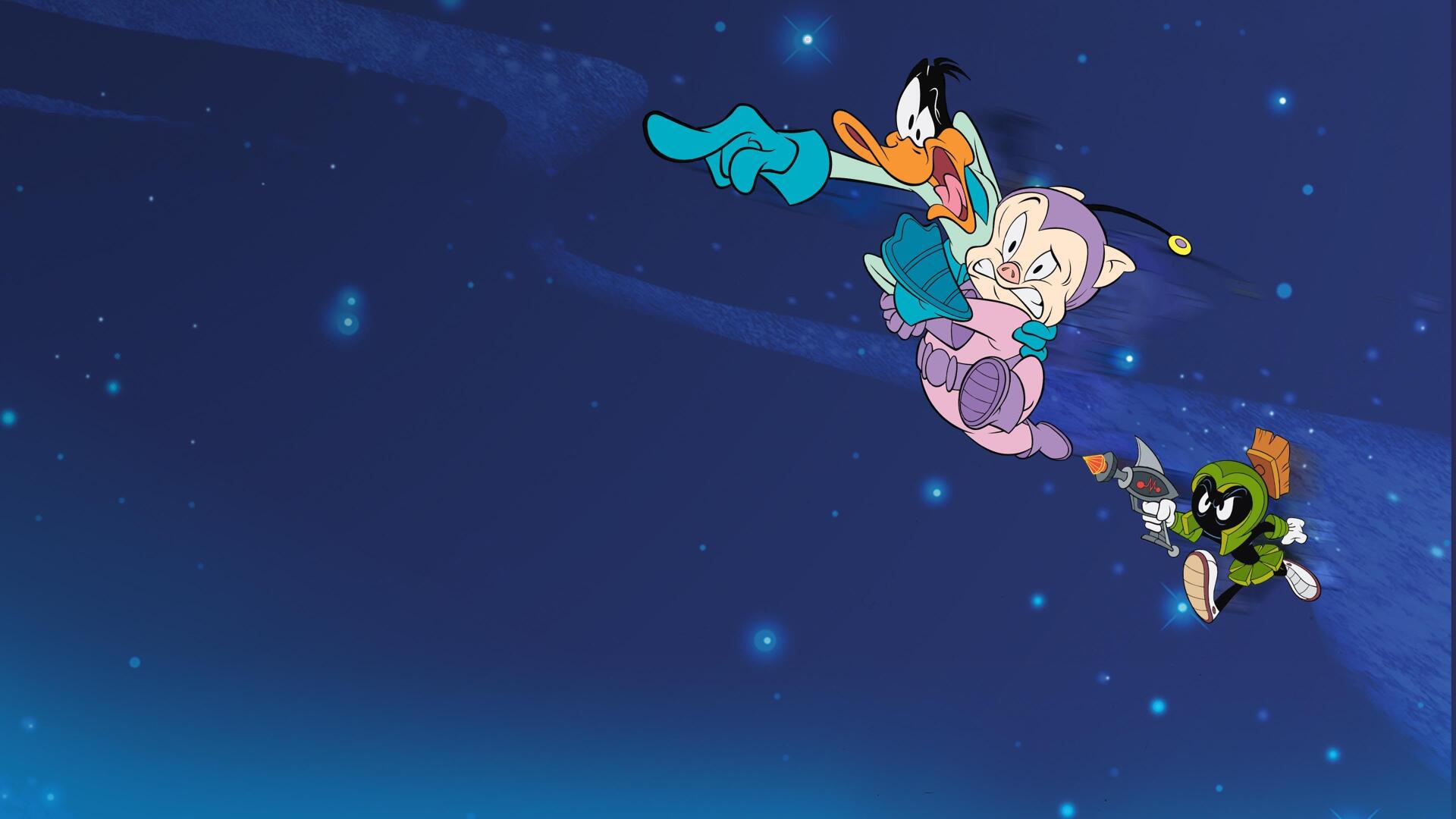 Duck Dodgers and companions soar through a starry night sky in this vibrant 4K Ultra HD PC desktop wallpaper and background.