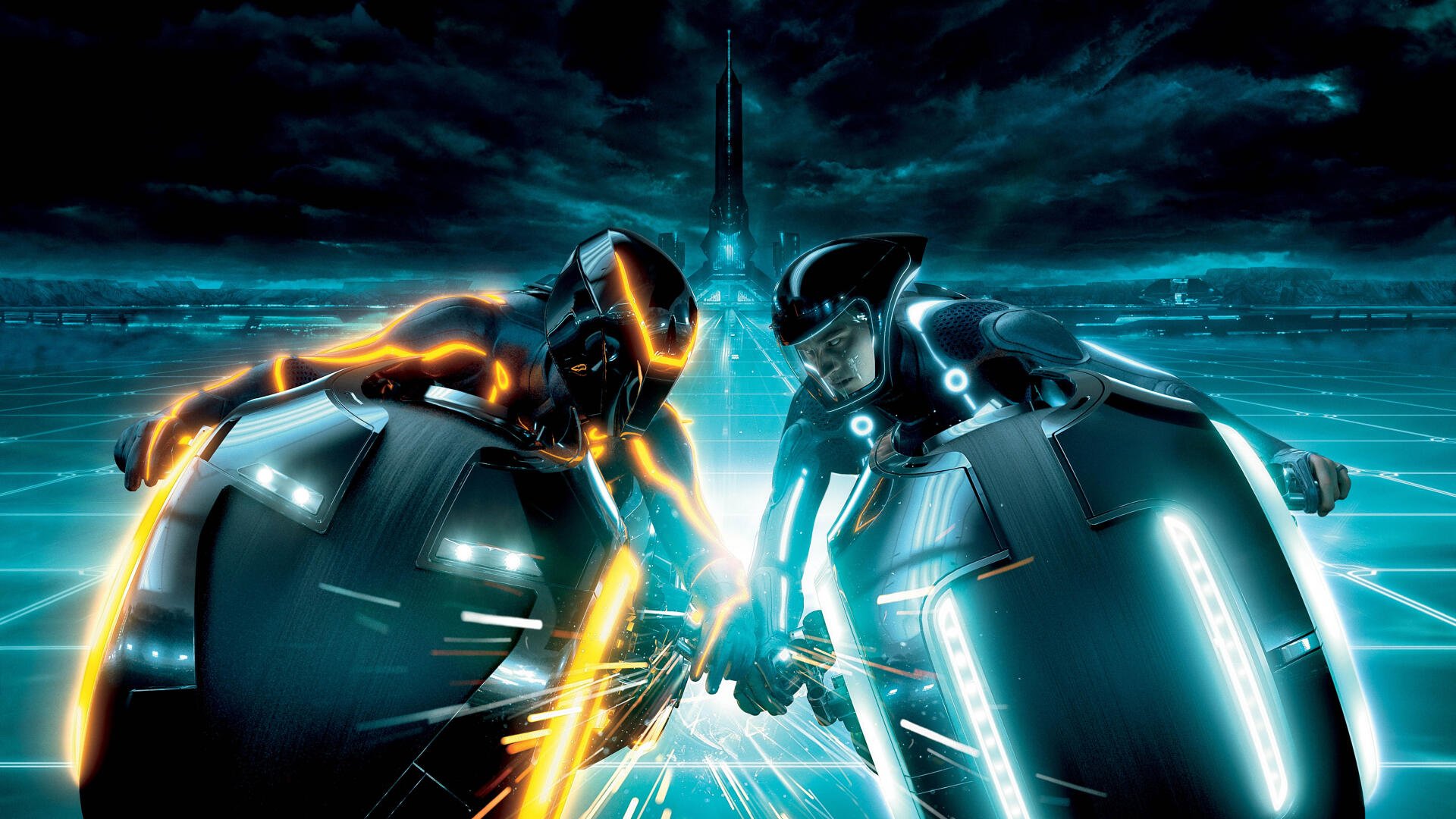 TRON: Legacy 4K Ultra HD PC desktop wallpaper - two light-cycle riders with orange and blue light trails clash on a neon grid beneath a distant spire.