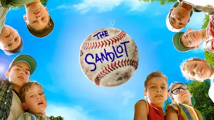The Sandlot HD PC desktop wallpaper and background: a baseball soaring toward the viewer, encircled by kids' faces against a vivid blue summer sky.
