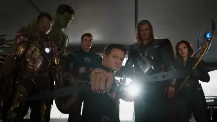 HD PC desktop wallpaper featuring Avengers superheroes including Captain America, Iron Man, Thor, Hawkeye, and Hulk standing together in a dramatic, shadowed scene.