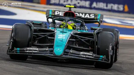 Close-up of Lewis Hamilton driving the Mercedes AMG Petronas F1 car with a sharp depth of field, captured as an HD desktop wallpaper and background.
