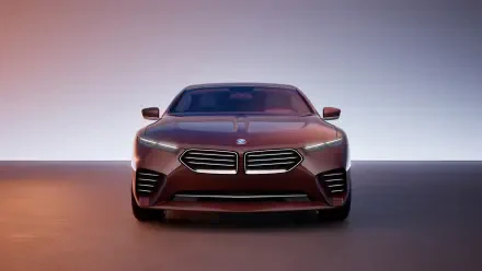 Front view of a sleek BMW Speedtop car showcased in an 8K Ultra HD desktop wallpaper with a gradient background.
