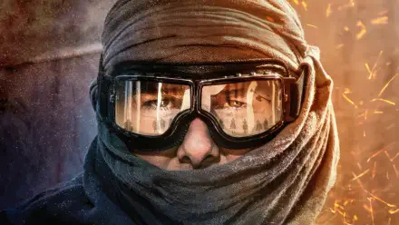 Masked agent close-up in goggles and wrapped scarf amid flying sparks — Mission: Impossible - Dead Reckoning Part One 4K Ultra HD PC desktop wallpaper and background.